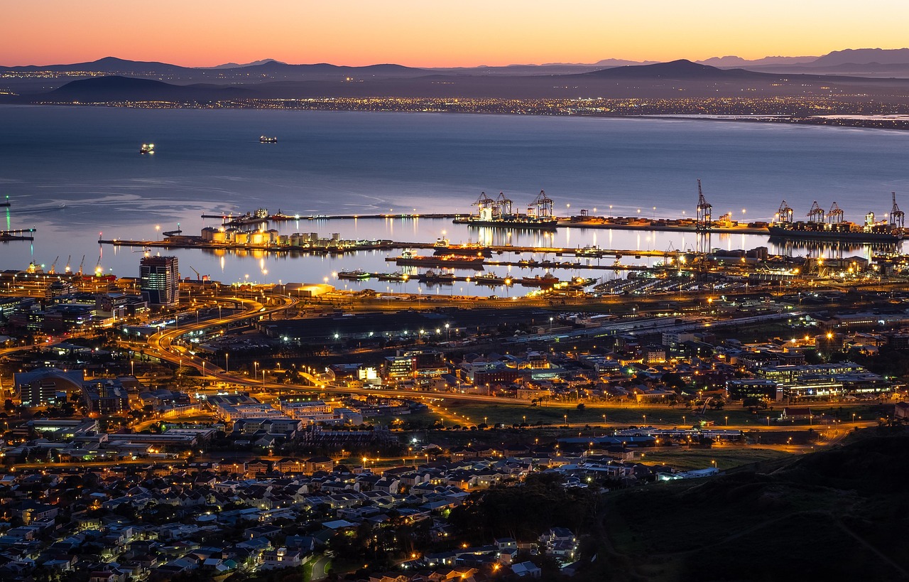 Capital Markets - Cape Town harbour and African financial hub at dusk